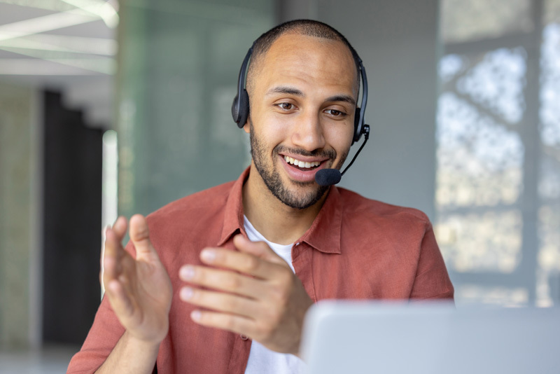 man-wearing-headset-talking-in-meeting
